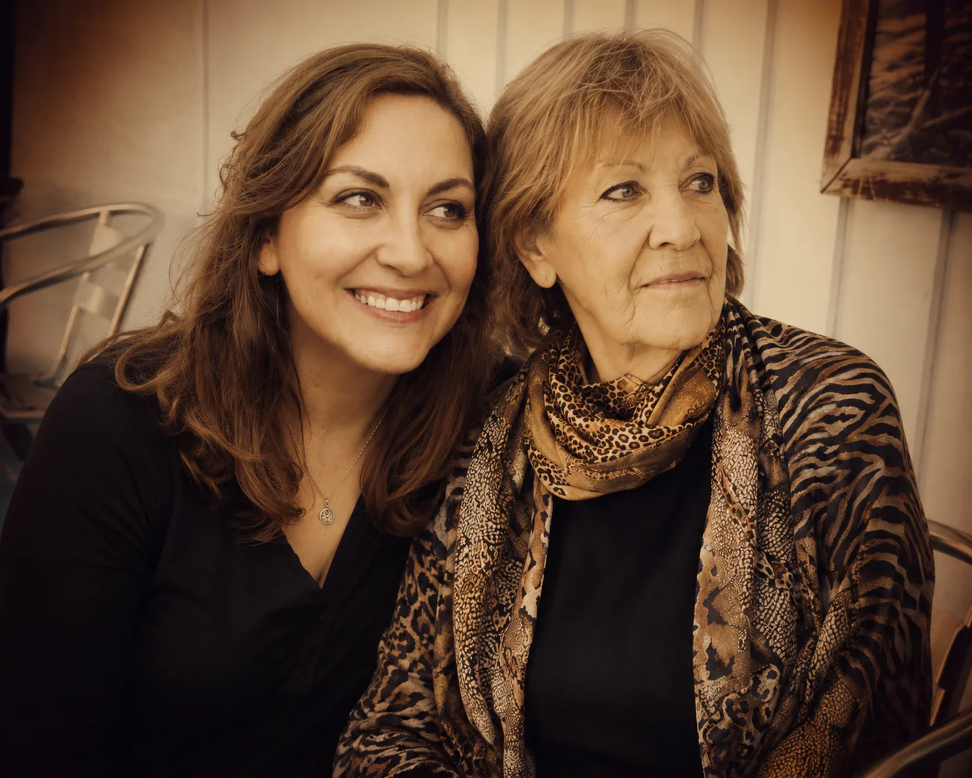 A photograph of the two Julies, mother and daughter, sitting together